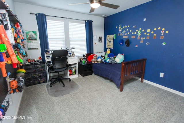 carpeted bedroom with ceiling fan