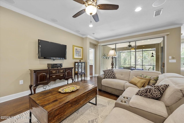 living room with crown molding, ceiling fan, and light hardwood / wood-style floors