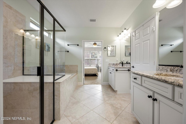 bathroom featuring tile patterned flooring, vanity, ceiling fan, and independent shower and bath