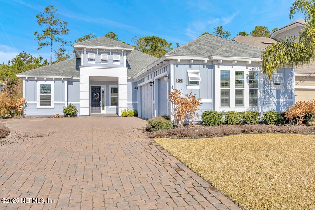 140 Cliffside Trl, Ponte Vedra, FL 32081 - view of front of house featuring a garage and a front yard