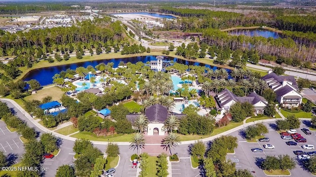 birds eye view of property featuring a water view