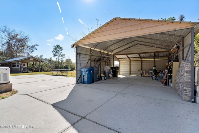 garage featuring a carport