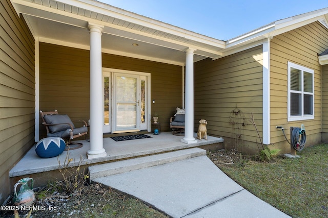 entrance to property with covered porch