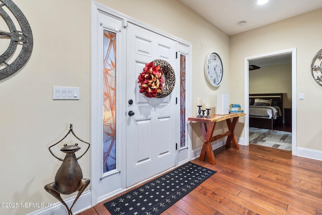 entrance foyer featuring hardwood / wood-style floors