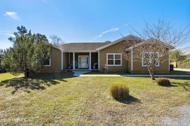 ranch-style house featuring a front lawn