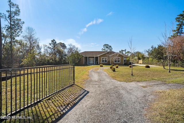 ranch-style house with a front yard