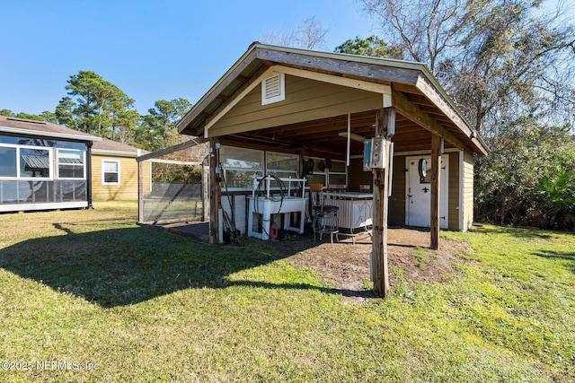 exterior space with an outbuilding and central AC unit