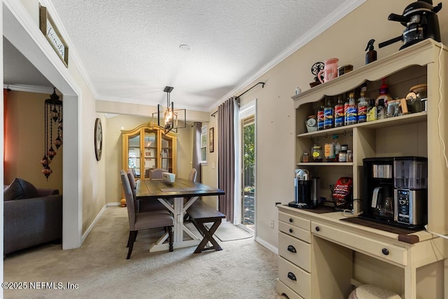 home office with light carpet, ornamental molding, a textured ceiling, and an inviting chandelier