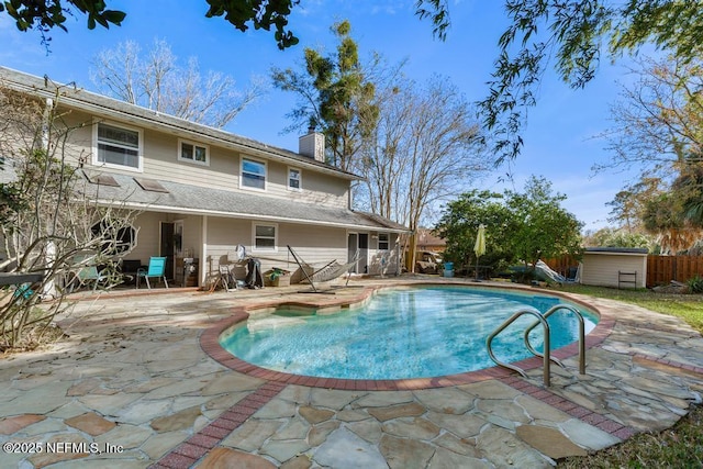 view of pool featuring a patio