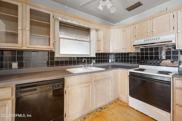 kitchen with dishwasher, sink, light hardwood / wood-style floors, electric stove, and decorative backsplash