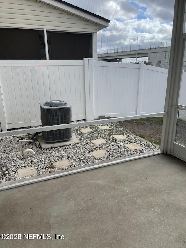 view of patio with central AC unit