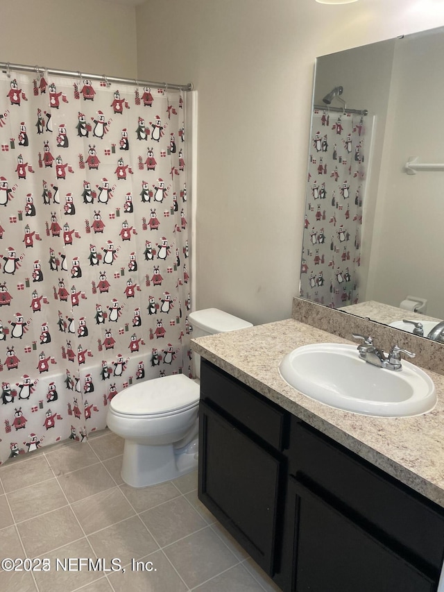 full bathroom featuring toilet, vanity, shower / washtub combination, and tile patterned flooring