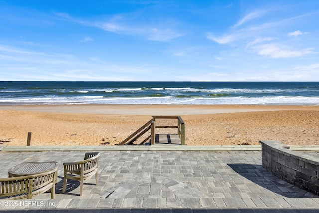 view of water feature with a view of the beach