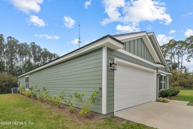 view of side of home with central AC