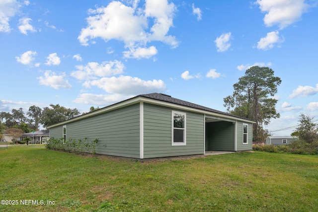 view of property exterior featuring a lawn