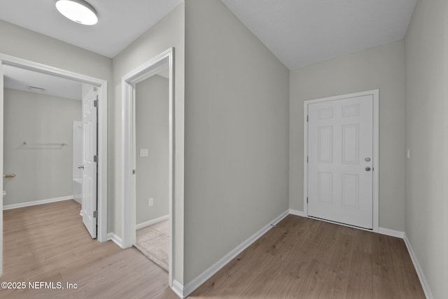 hallway featuring light wood-type flooring