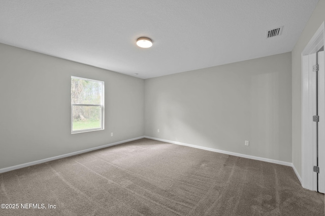 unfurnished room with carpet floors