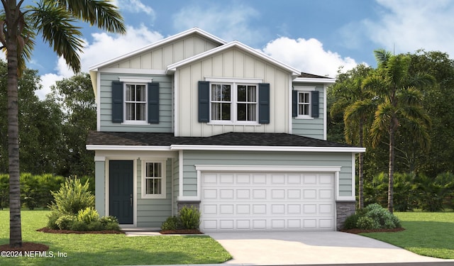 view of front of house with a garage and a front lawn