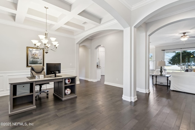 office space featuring coffered ceiling, ornamental molding, dark hardwood / wood-style flooring, beamed ceiling, and ceiling fan