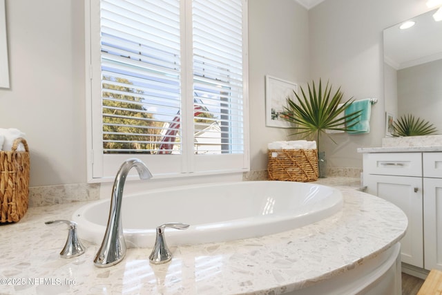 bathroom featuring vanity and crown molding