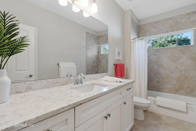 full bathroom featuring vanity, tile patterned flooring, shower / bath combo, and toilet