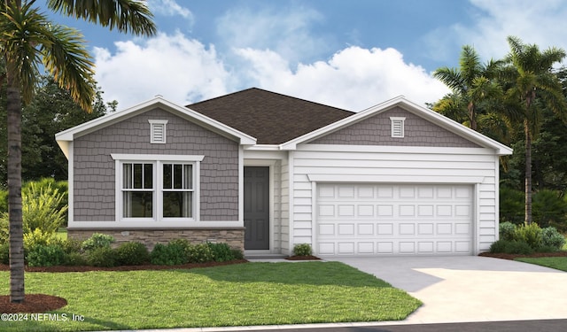 view of front of home with a garage and a front lawn