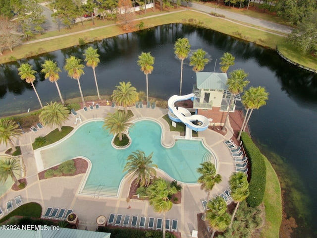 view of pool with a water view