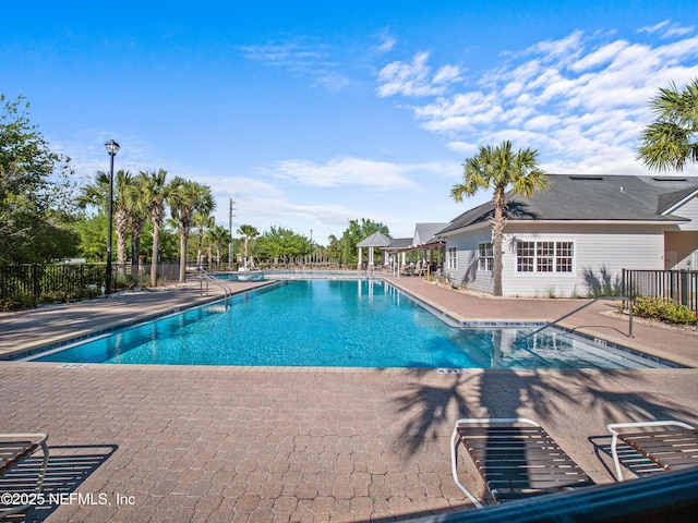 view of swimming pool featuring a patio