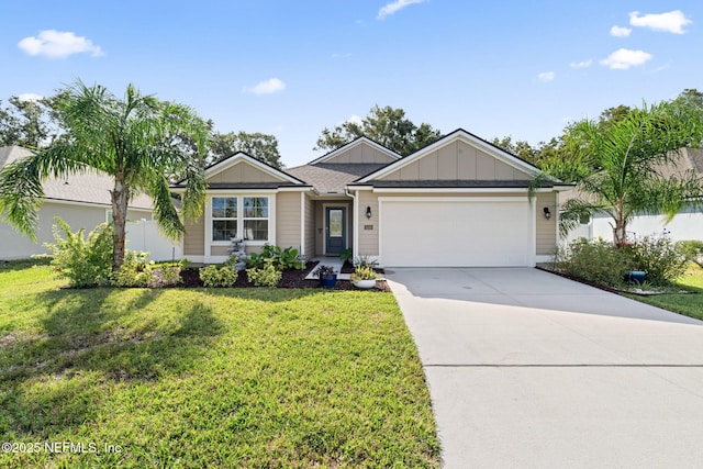 view of front facade featuring a garage and a front lawn