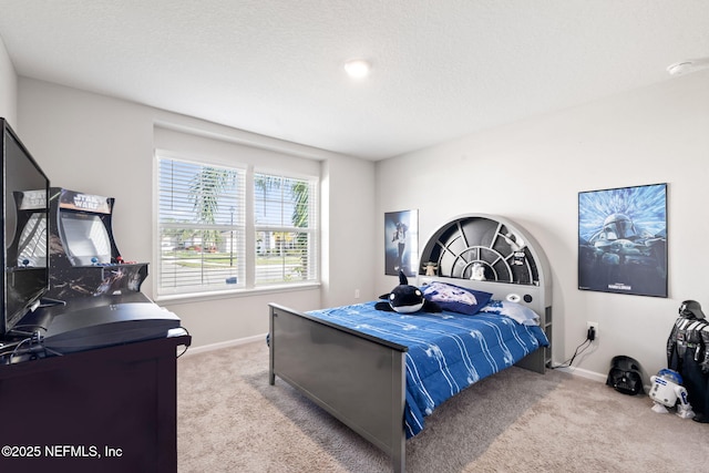 carpeted bedroom featuring a textured ceiling