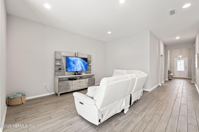 living room featuring light hardwood / wood-style flooring