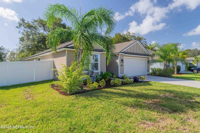 single story home with a garage and a front lawn