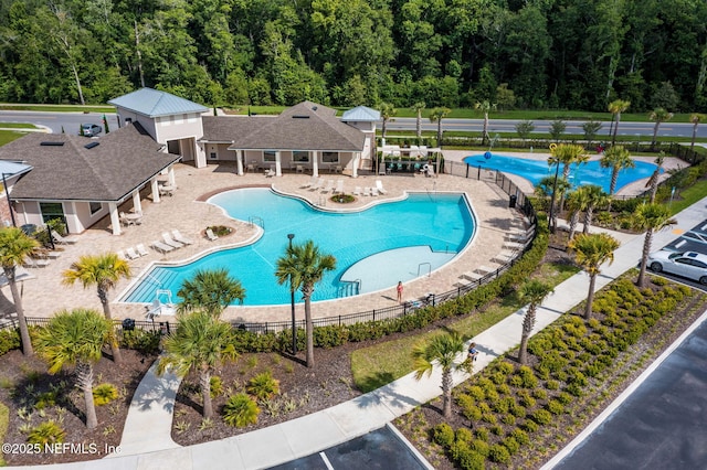 view of swimming pool featuring a patio