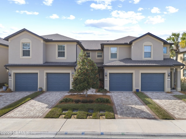 view of front of property with a garage