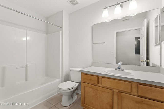 full bathroom with tile patterned flooring, visible vents, vanity, and toilet