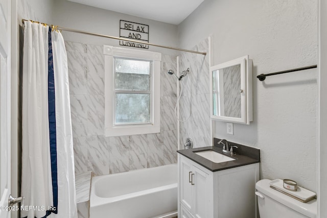 full bathroom featuring vanity, toilet, and shower / bathtub combination with curtain