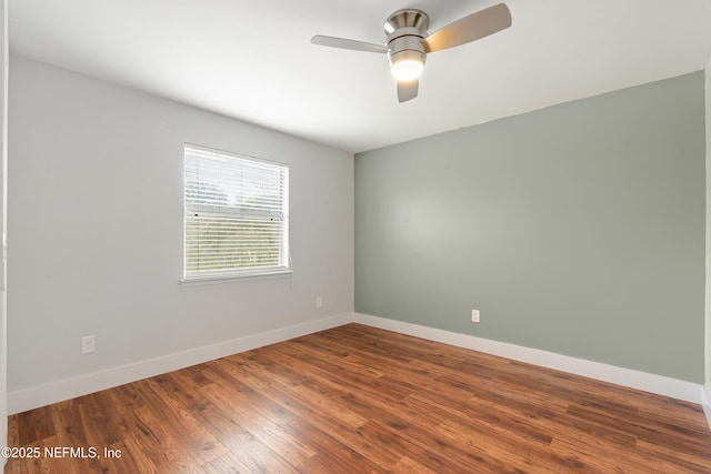 unfurnished room with hardwood / wood-style flooring and ceiling fan