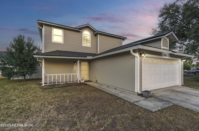 view of front of house with a yard and a porch