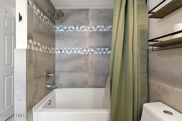 bathroom with shower / bath combo with shower curtain and toilet