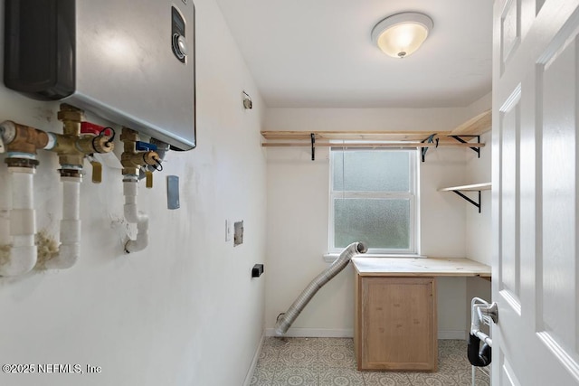 laundry area with washer hookup, electric dryer hookup, and water heater