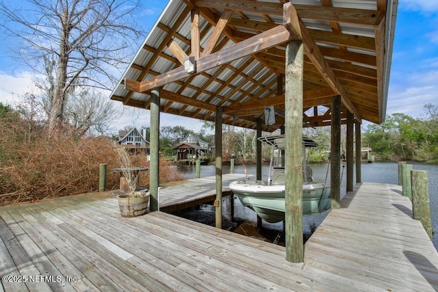 view of dock with a water view