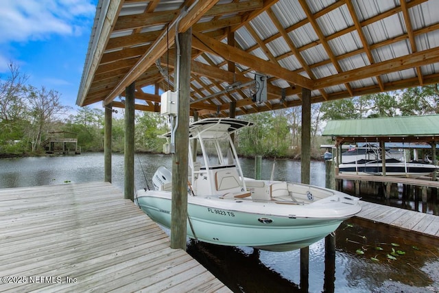 dock area featuring a water view