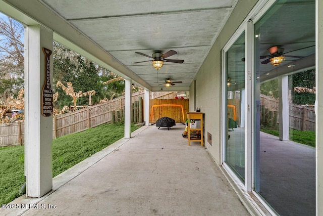 view of patio with ceiling fan