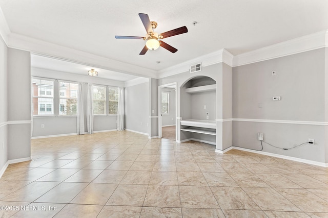 8550 Touchton Rd Unit 127, Jacksonville, FL 32216 - unfurnished room featuring ornamental molding, a ceiling fan, and arched walkways