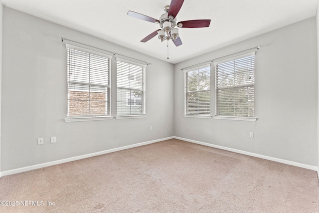 8550 Touchton Rd Unit 127, Jacksonville, FL 32216 - carpeted empty room featuring baseboards and a ceiling fan
