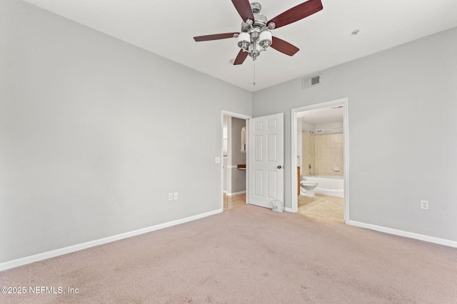 8550 Touchton Rd Unit 127, Jacksonville, FL 32216 - unfurnished bedroom featuring carpet flooring, ensuite bathroom, and ceiling fan