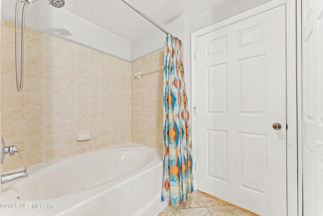8550 Touchton Rd Unit 127, Jacksonville, FL 32216 - bathroom with shower / tub combo and tile patterned floors