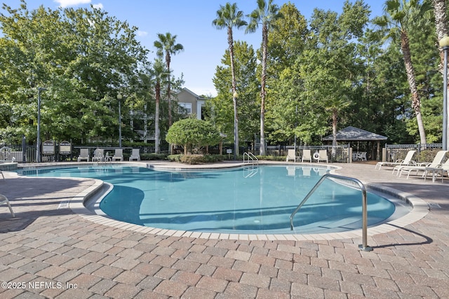 8550 Touchton Rd Unit 127, Jacksonville, FL 32216 - community pool featuring a gazebo and a patio area