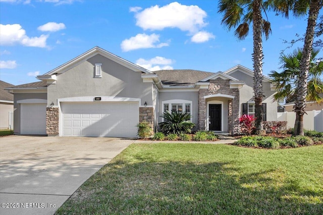 view of front facade featuring a front lawn and a garage