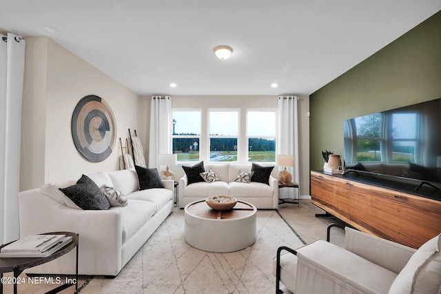 living room with light tile patterned flooring